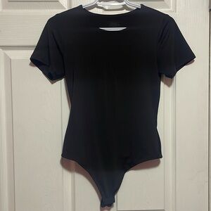 Black shirt sleeve body suit
